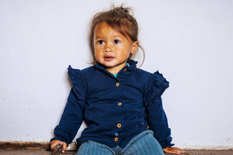 Baby blouse met ruffles